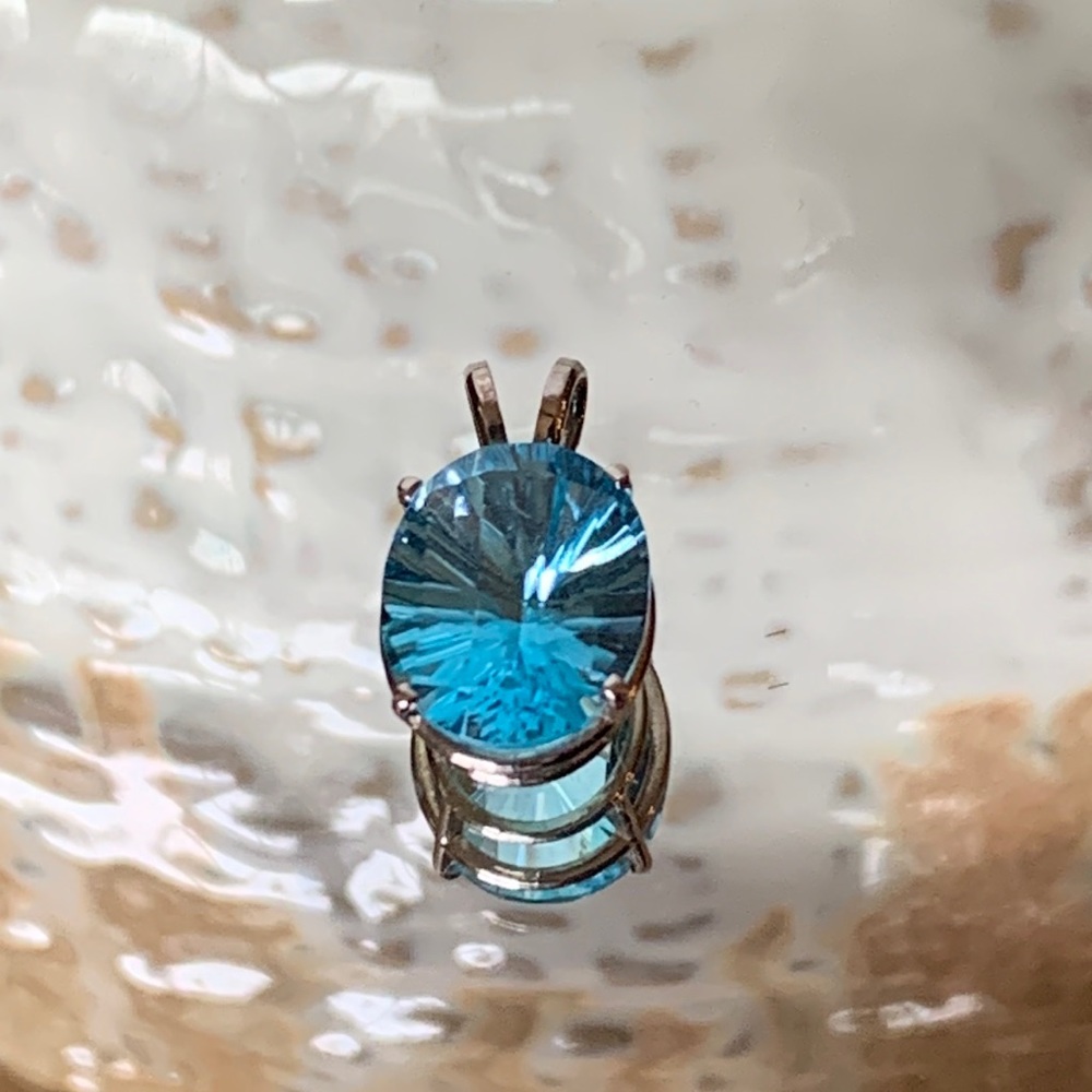 🌟SOLD🌟 14K White Gold Starburst Oval Cut Blue Topaz Pendant